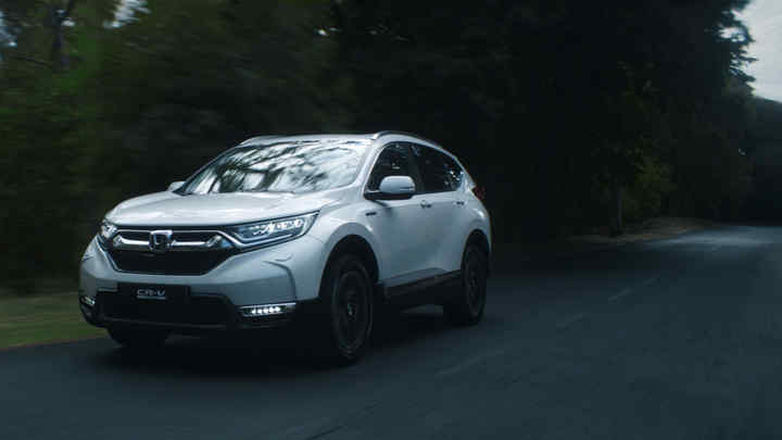 Vy från sidan av Honda CR-V Hybrid.