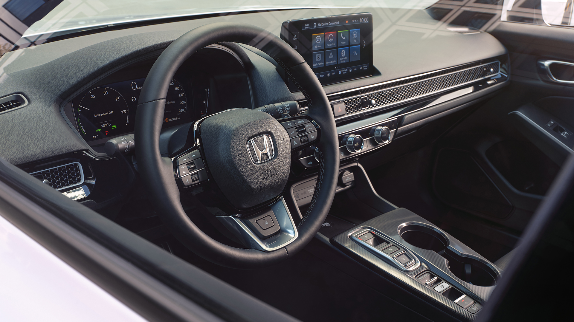 Angled view of the Honda civic hybrid' interior, focusing on the steering wheel.