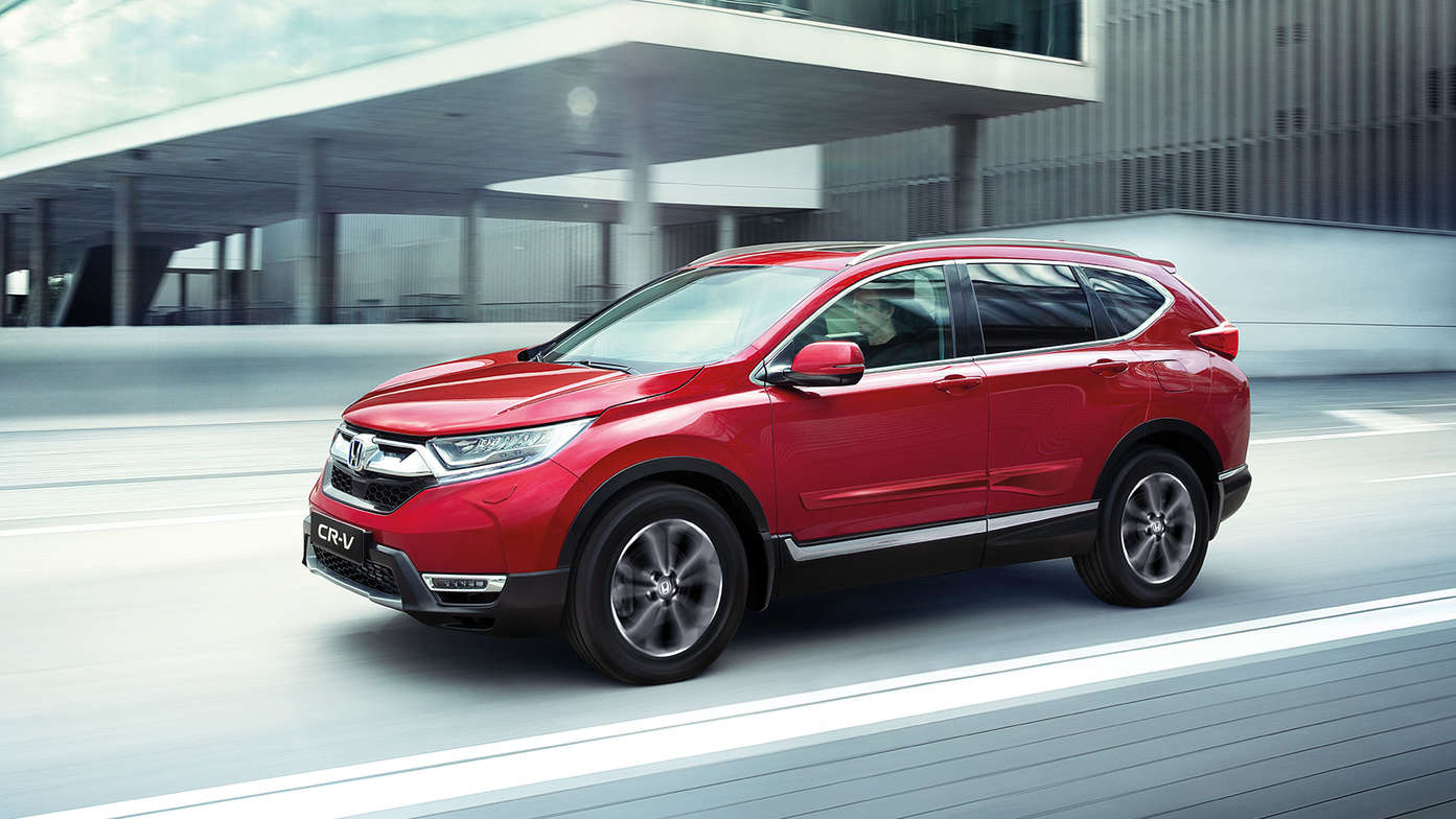Trekvartsvy från sidan av Honda CR-V Hybrid med komfortpaket.
