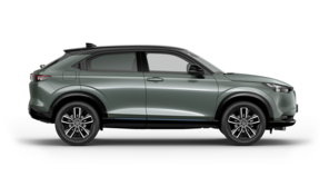 En grön HR-V Hybrid, vy från sidan