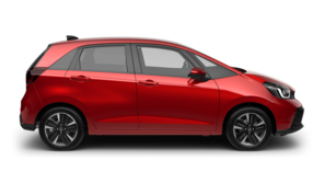 En röd Honda Jazz, vy från sidan