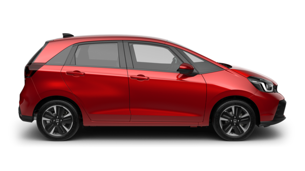 En röd Honda Jazz, vy från sidan