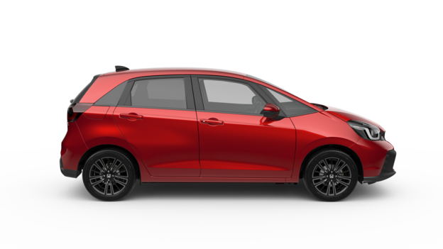 En röd Honda Jazz, vy från sidan