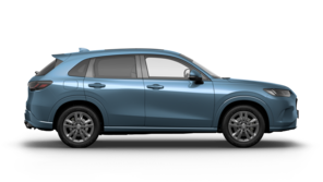 En vit ZR-V Hybrid vy från sidan