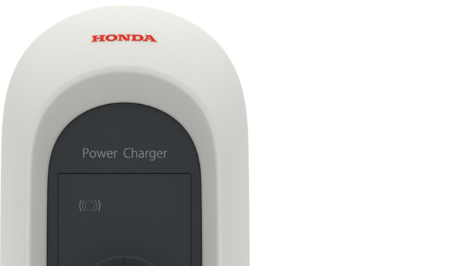 Honda e laddare under användning.