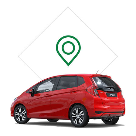 Trekvartsvy bakifrån till höger på Honda Jazz med bild på återförsäljare.
