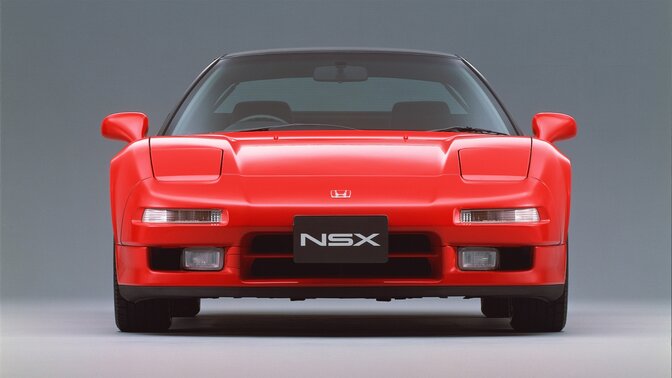 Vy framifrån av Honda NSX i en studio.