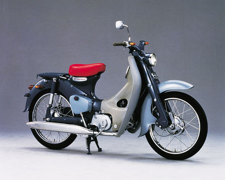 Sidovy av Honda Super Cub.