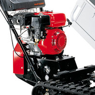 N&auml;rbild av bandvagnens motor.