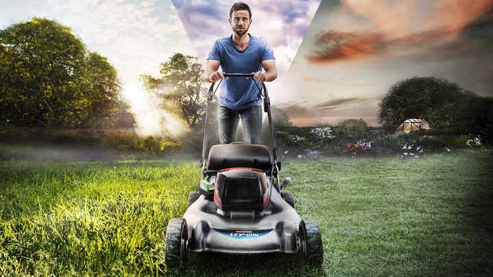 Front view of izy-ON mower pushed by a model with two different garden backgrounds.