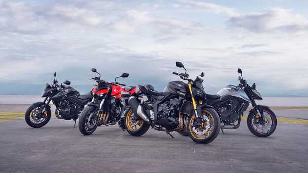 CB1100 motorcykel exteriör sidovy med ryttare