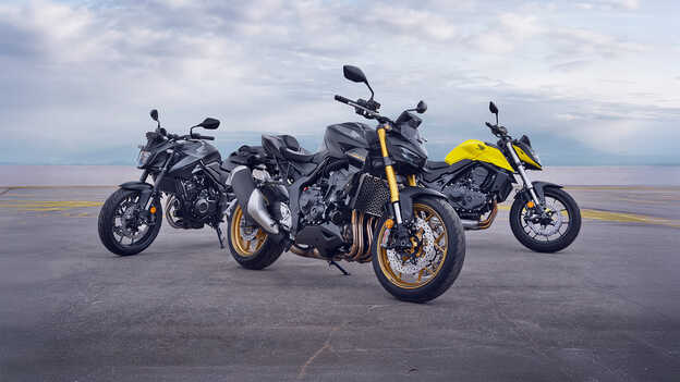 CB1100 motorcykel exteriör sidovy med ryttare