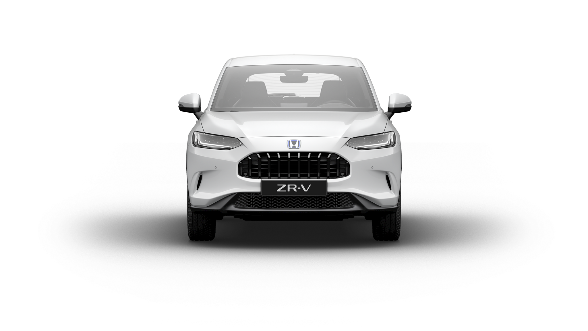 En vit Honda ZR-V Elegance sedd framifrån