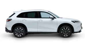 En vit ZR-V Hybrid vy från sidan